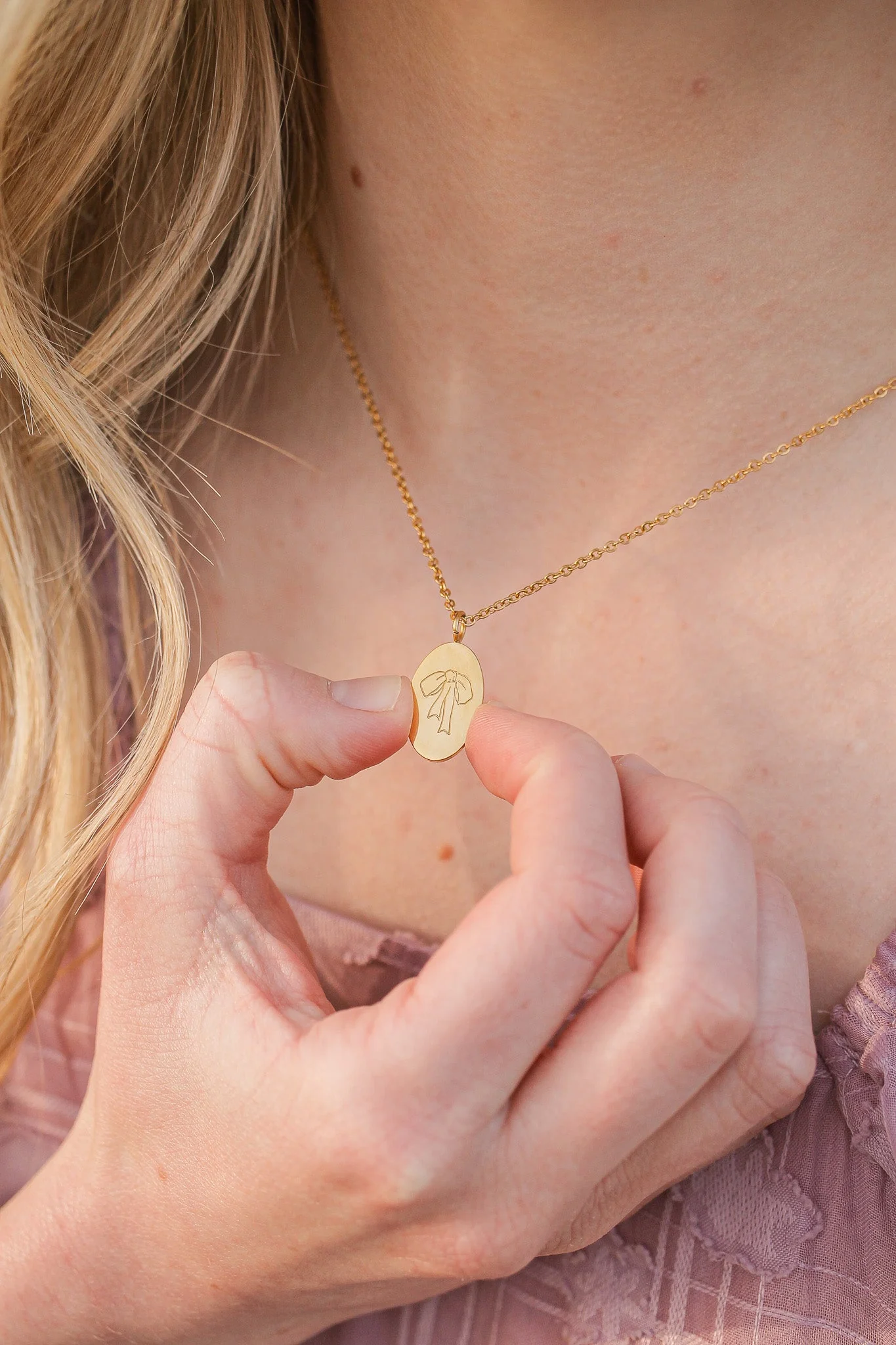Bow Pendant Necklace in Gold - Image 10