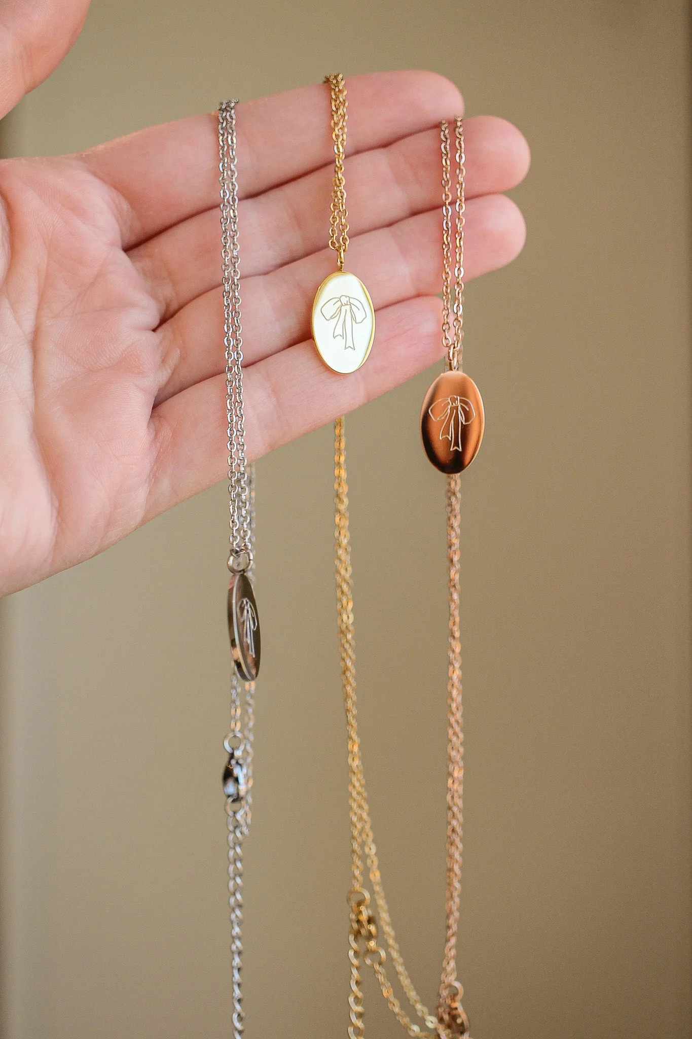 Bow Pendant Necklace in Gold - Image 2
