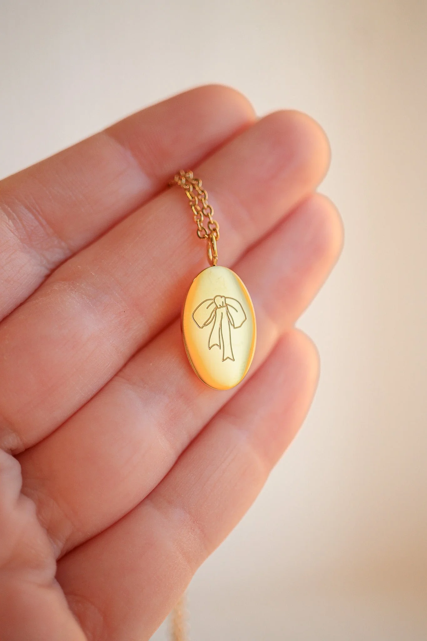 Bow Pendant Necklace in Gold - Image 3