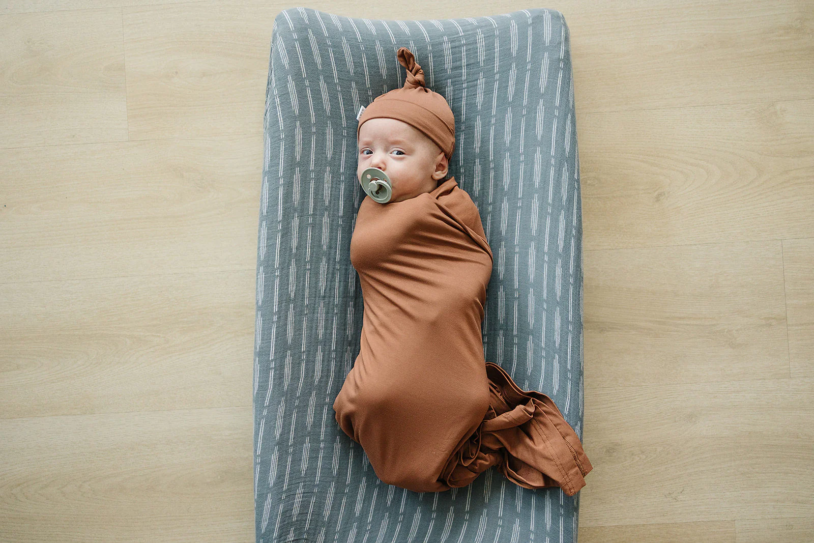 Rust Bamboo Stretch Swaddle - Image 7